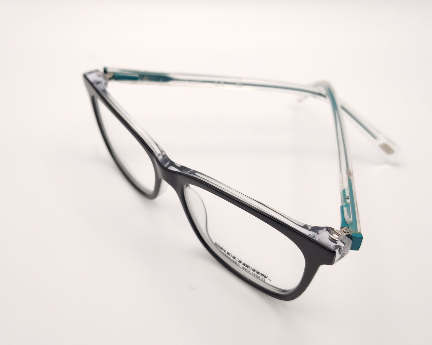 gafas graduadas skechers infantiles negras con varillas transparentes y detalles azules