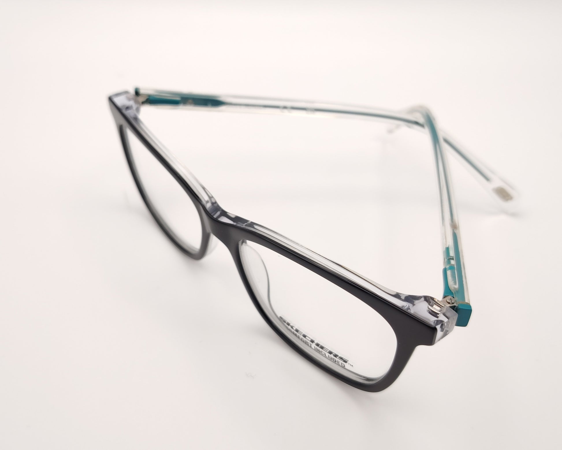 gafas graduadas skechers infantiles negras con varillas transparentes y detalles azules
