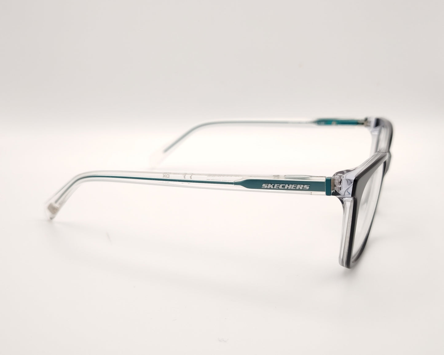 gafas graduadas skechers infantiles negras con varillas transparentes y detalles azules