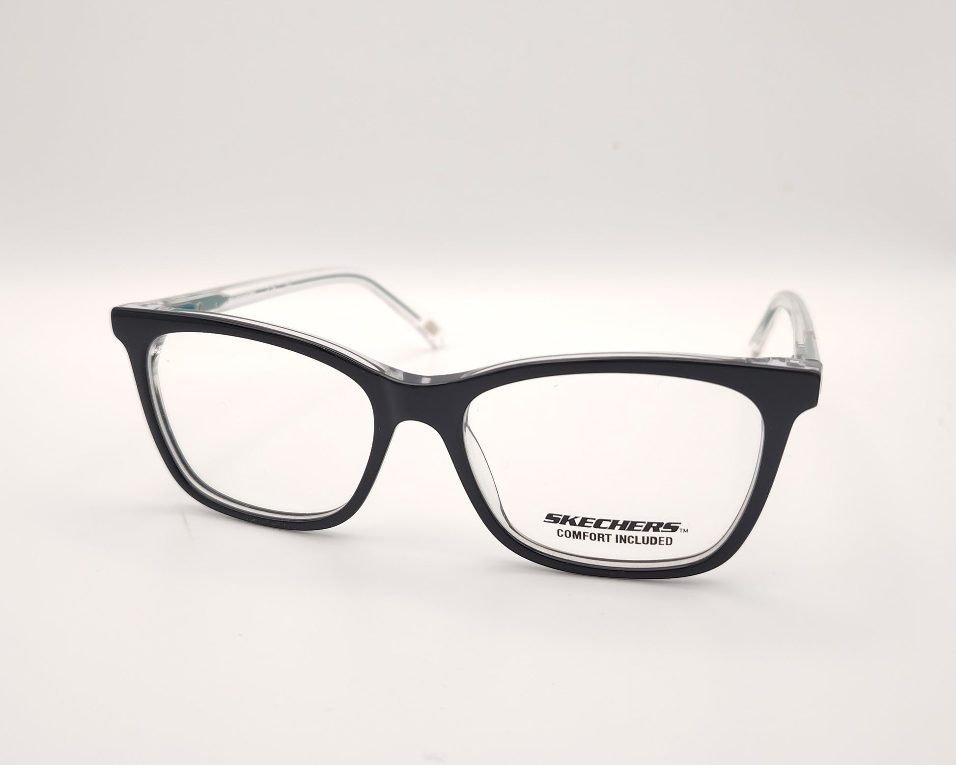 gafas graduadas skechers infantiles negras con varillas transparentes y detalles azules