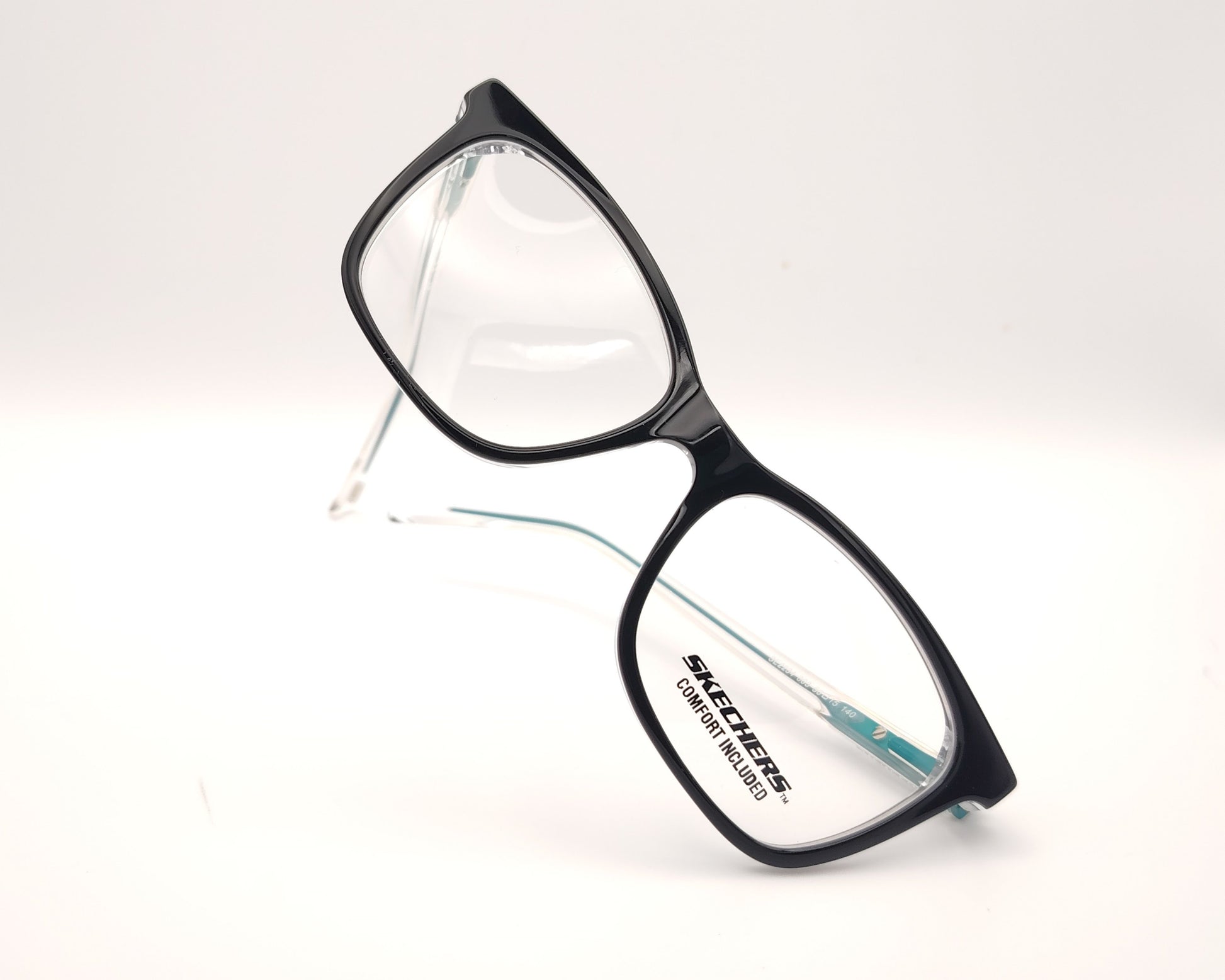 gafas graduadas skechers infantiles negras con varillas transparentes y detalles azules