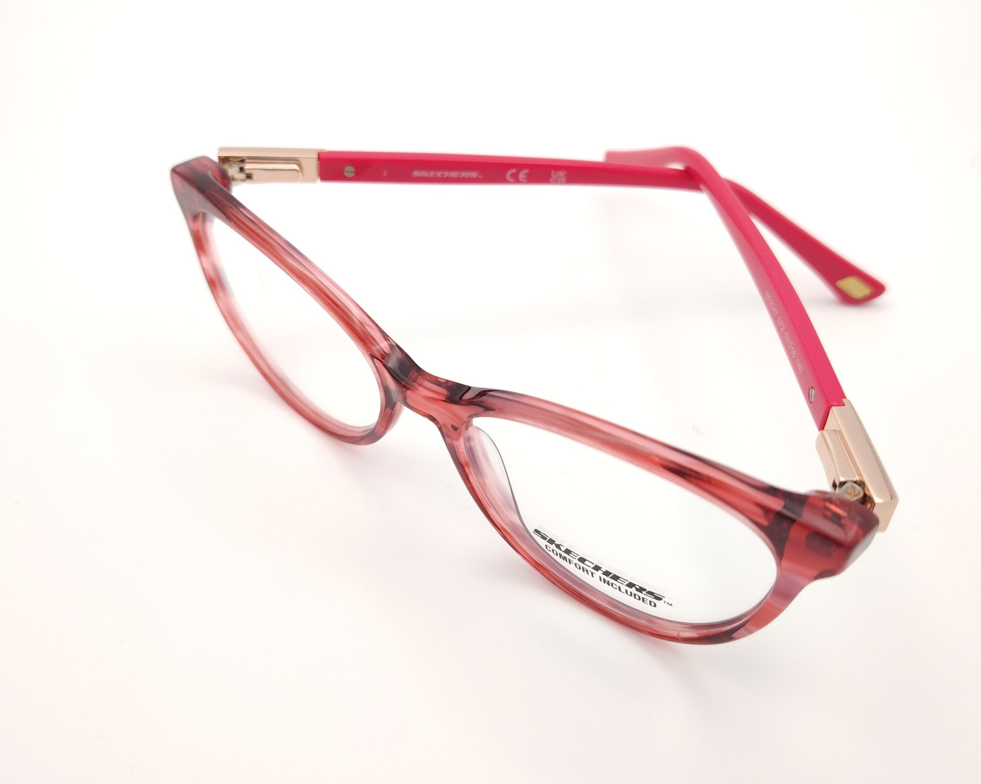 gafas graduadas skechers infantiles rojas translúcidas con varillas rosas