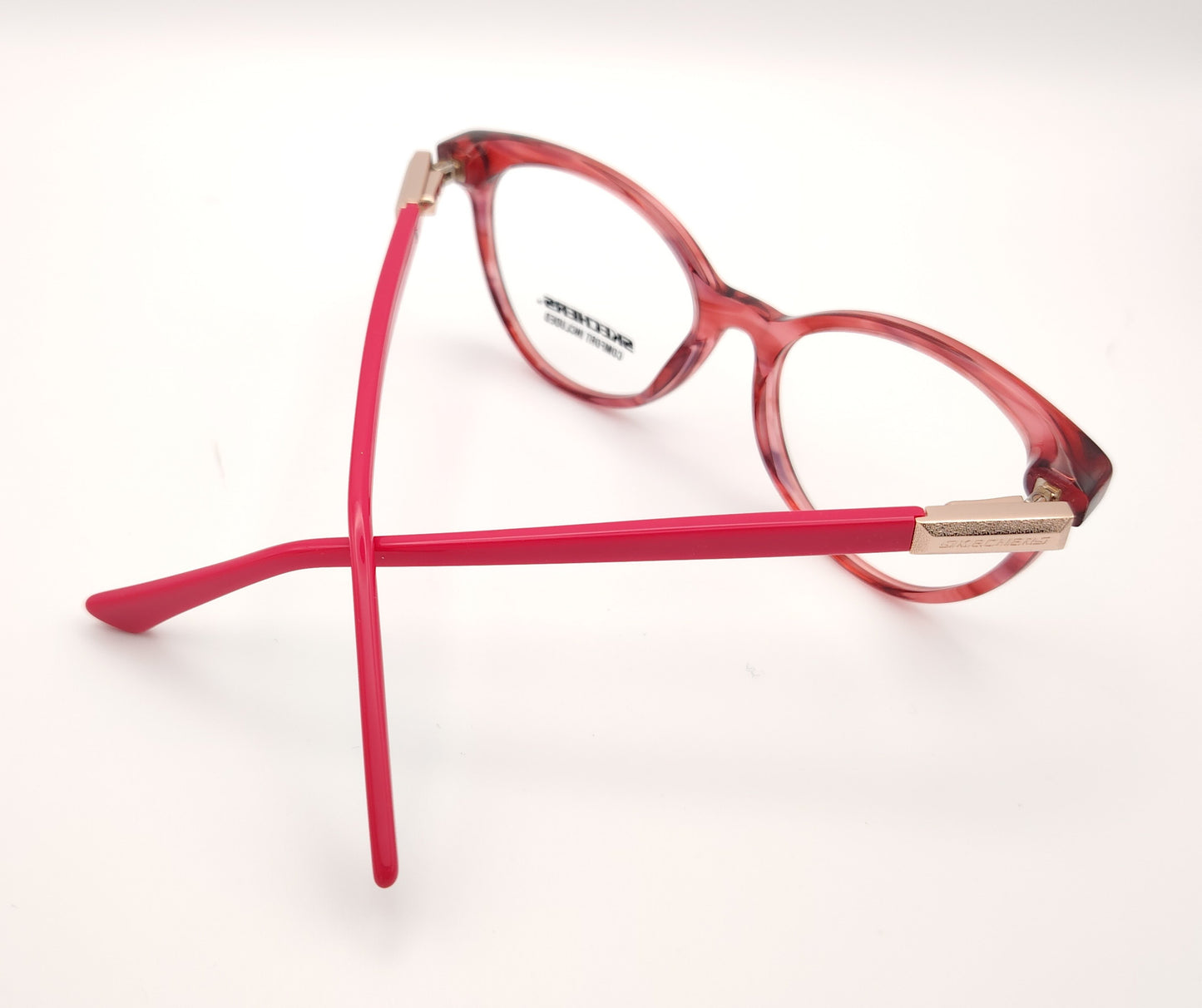 gafas graduadas skechers infantiles rojas translúcidas con varillas rosas