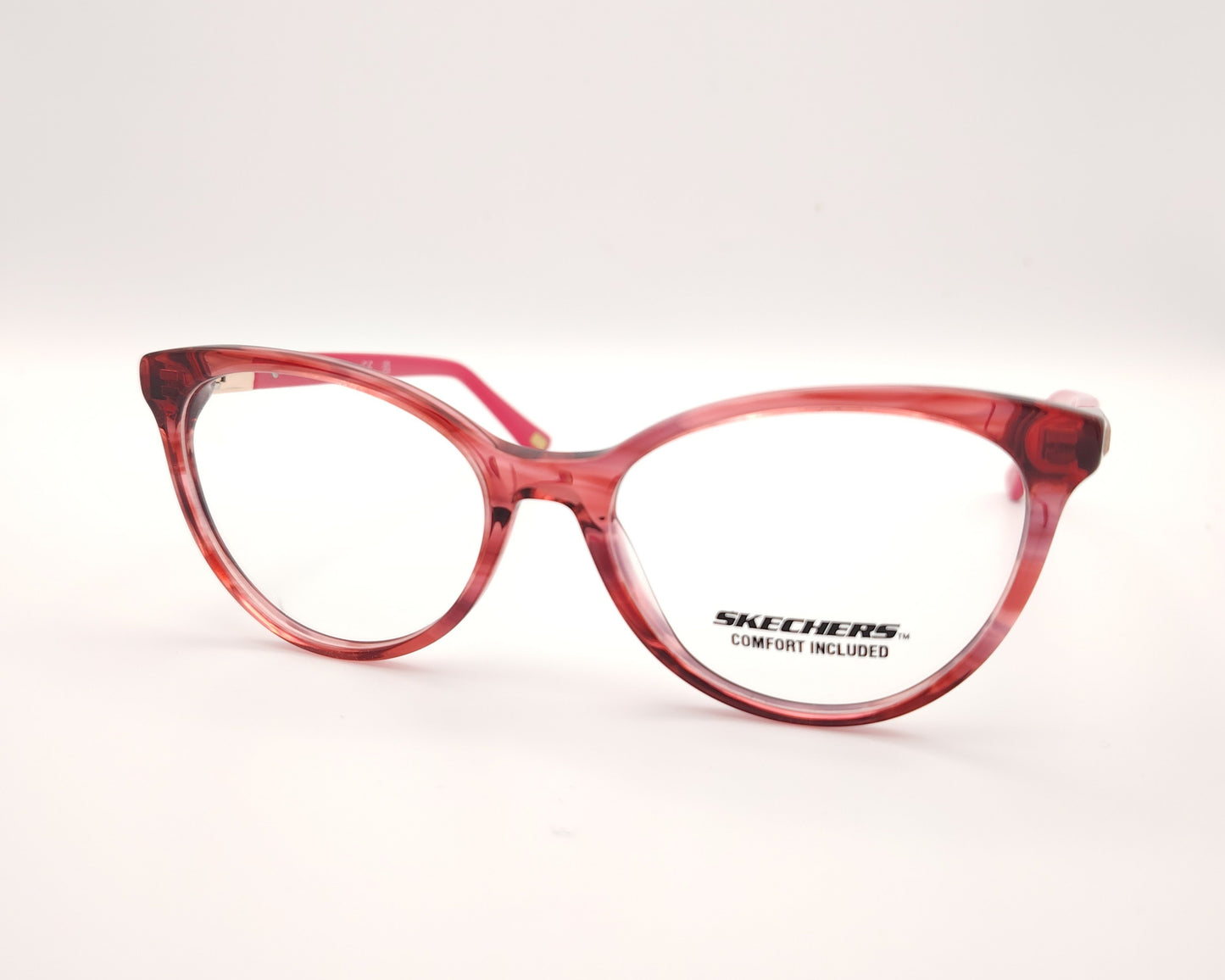 gafas graduadas skechers infantiles rojas translúcidas con varillas rosas