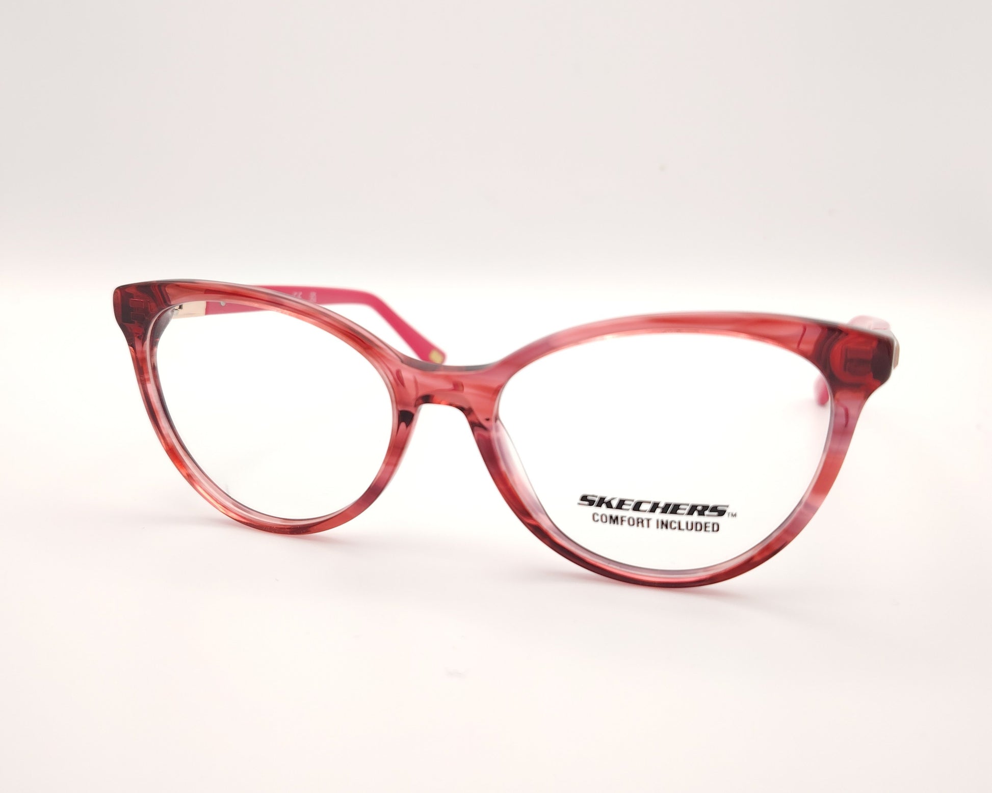 gafas graduadas skechers infantiles rojas translúcidas con varillas rosas