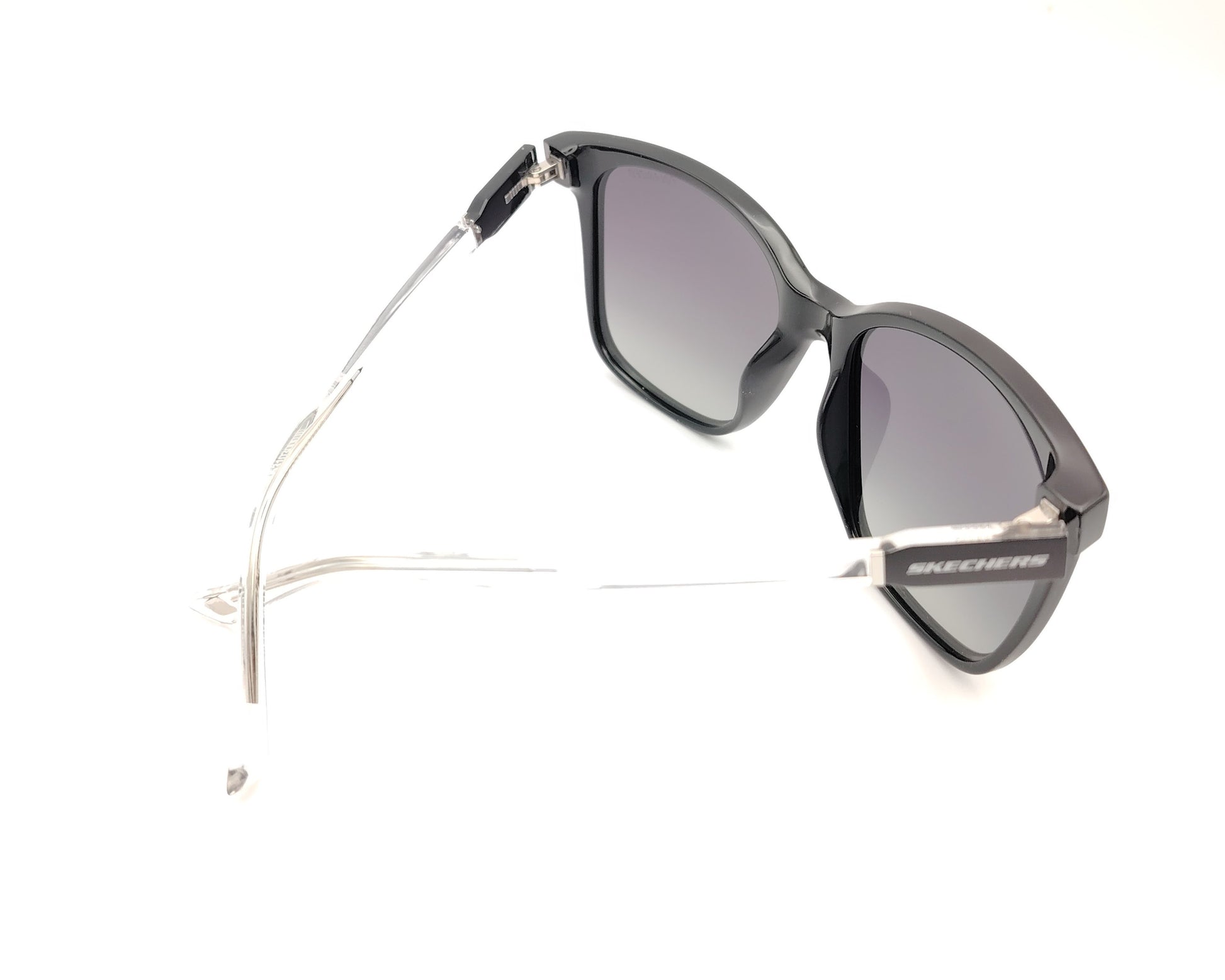 gafas de sol skechers se6295 01d negras con lentes grises degradadas polarizadas