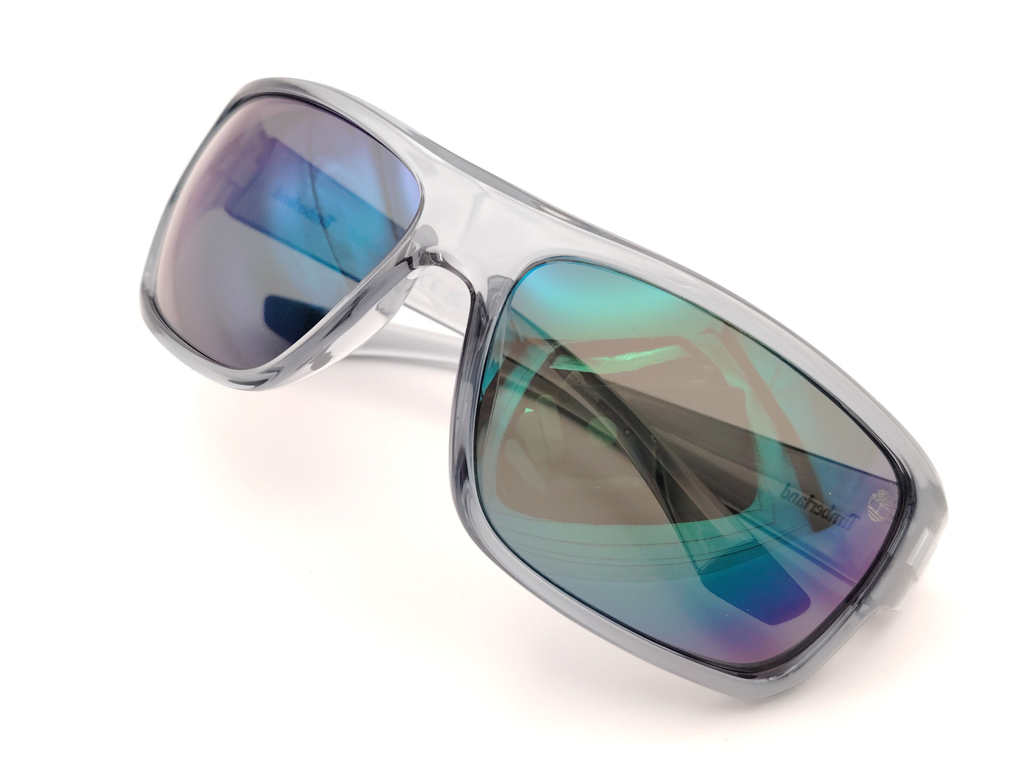 gafas de sol polarizadas gris translucido con lentes espejo iridiscentes azul y verde