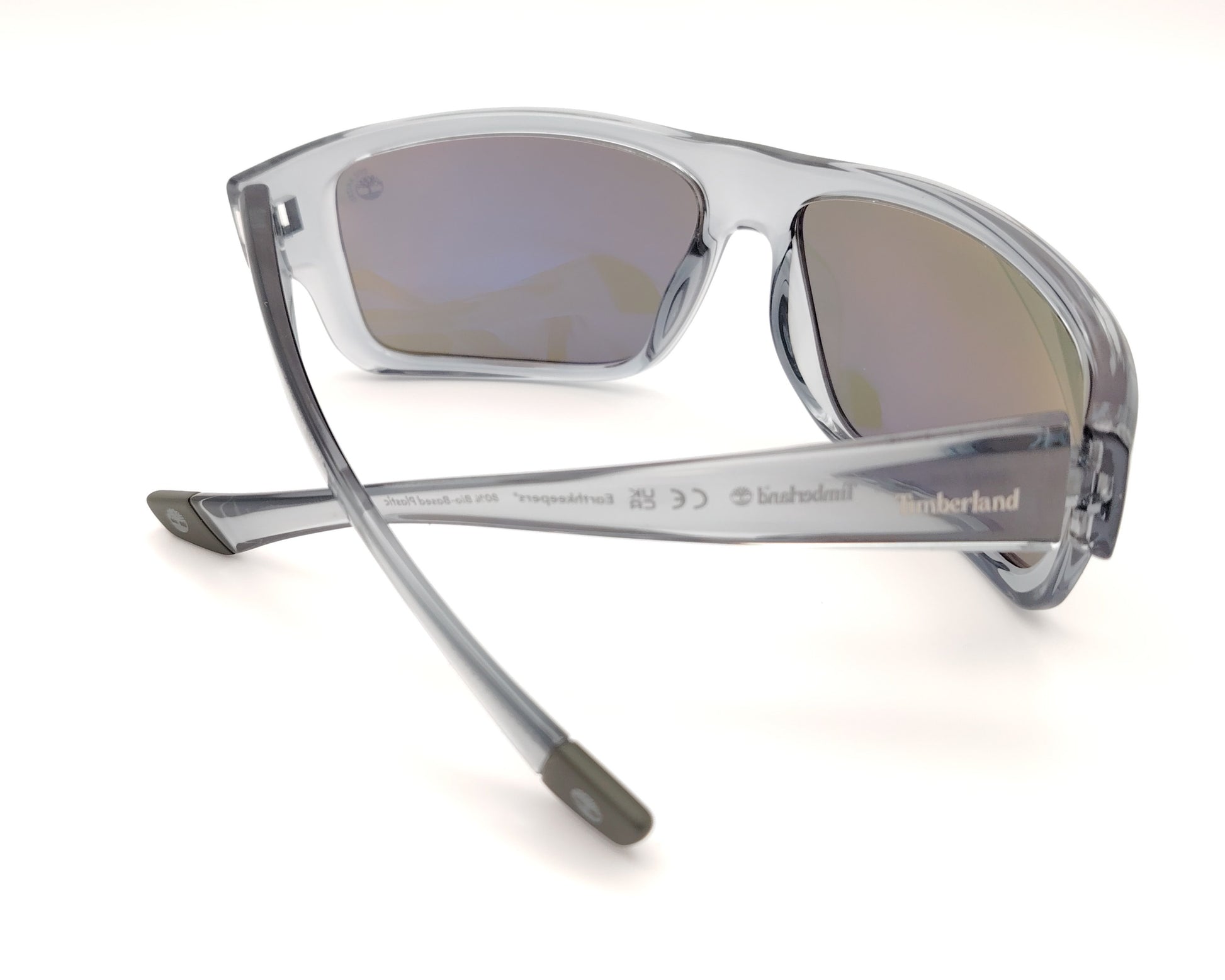 gafas de sol polarizadas gris translucido con lentes espejo iridiscentes azul y verde