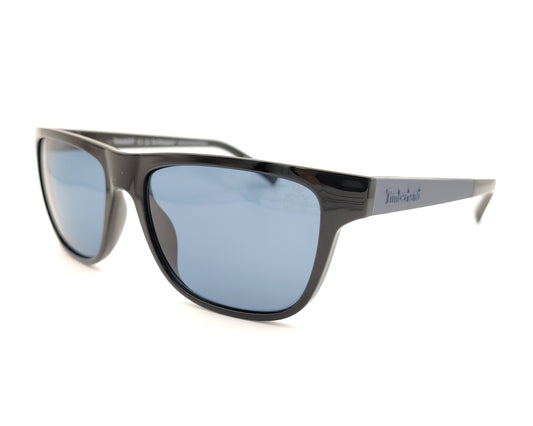 gafas de sol negras polarizadas con lentes azul y diseño rectangular