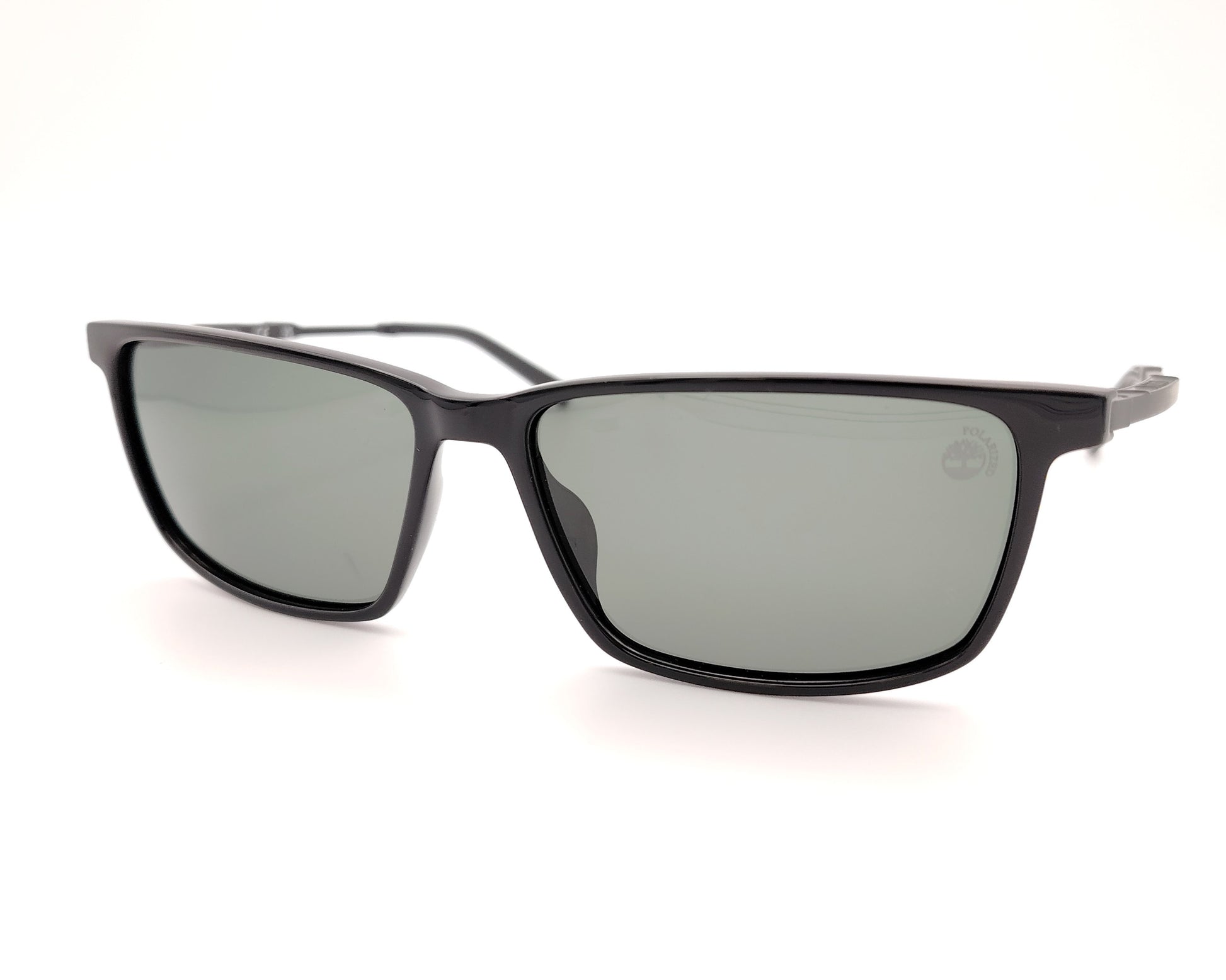 gafas de sol negras polarizadas con lentes gris y diseño rectangular moderno