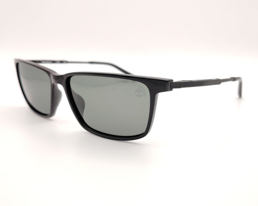 gafas de sol negras polarizadas con lentes gris y diseño rectangular moderno