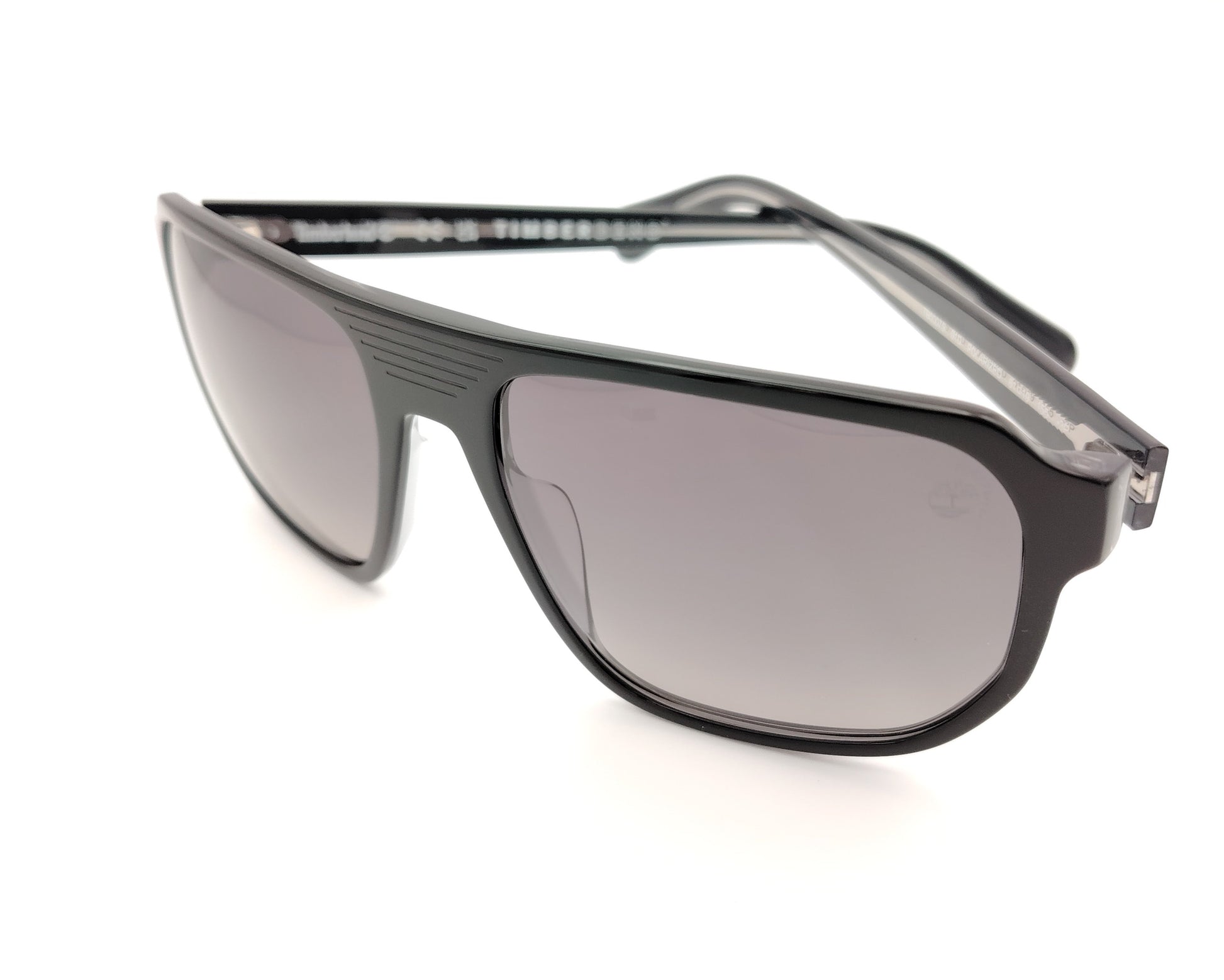 gafas de sol gris oscuro polarizadas con lentes gris degradado y montura grande deportiva