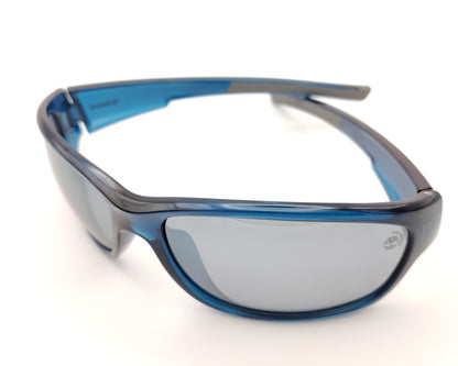 gafas de sol polarizadas azul translúcido con lentes espejo gris y diseño deportivo envolvente