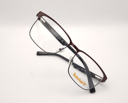 gafas de vista timberland con montura rectangular de metal en color burdeos con varillas negras de acabado mate
