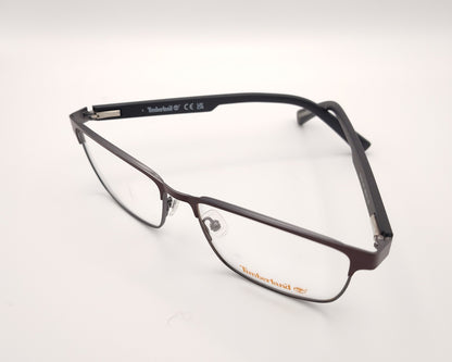 gafas de vista timberland con montura rectangular de metal en color burdeos y gris plomo con varillas negras de acabado mate
