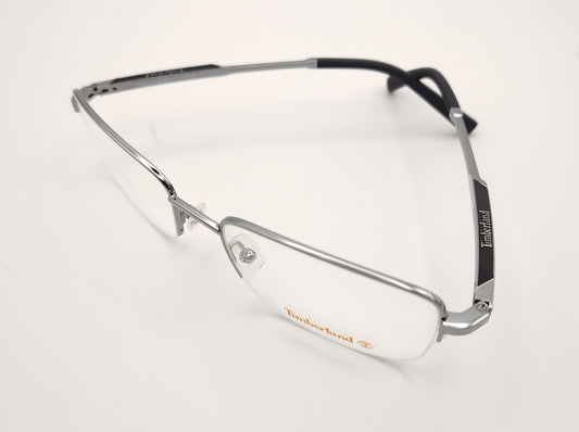 gafas de vista timberland de media montura metálica en color plateado con varillas rectangulares y terminales negros