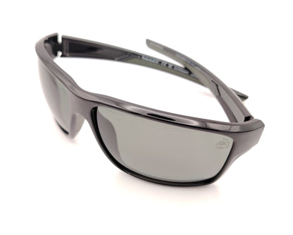 gafas de sol negras polarizadas con lentes gris y diseño deportivo envolvente
