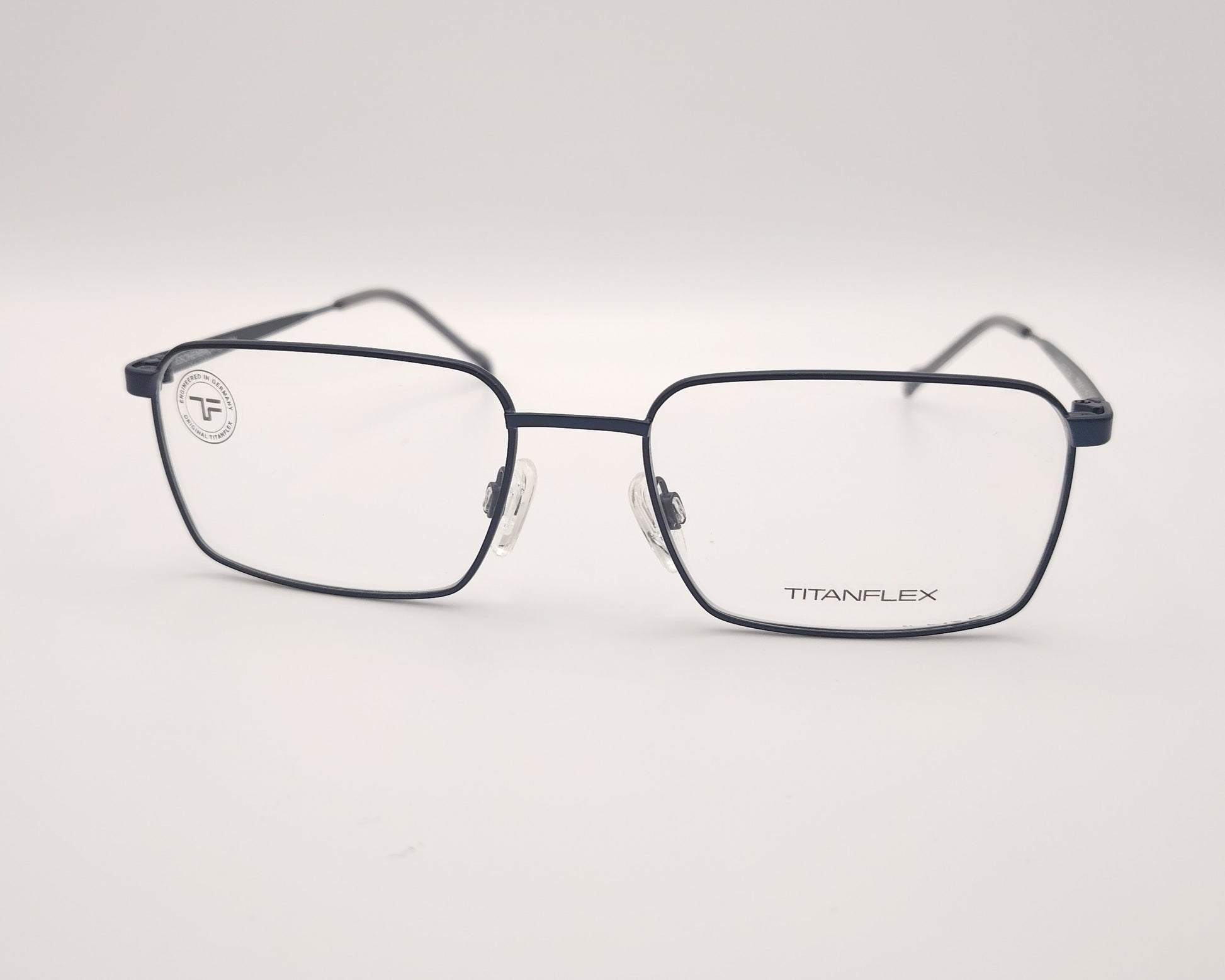 gafas titanflex rectangulares azul marino con montura metálica ligera y varillas finas