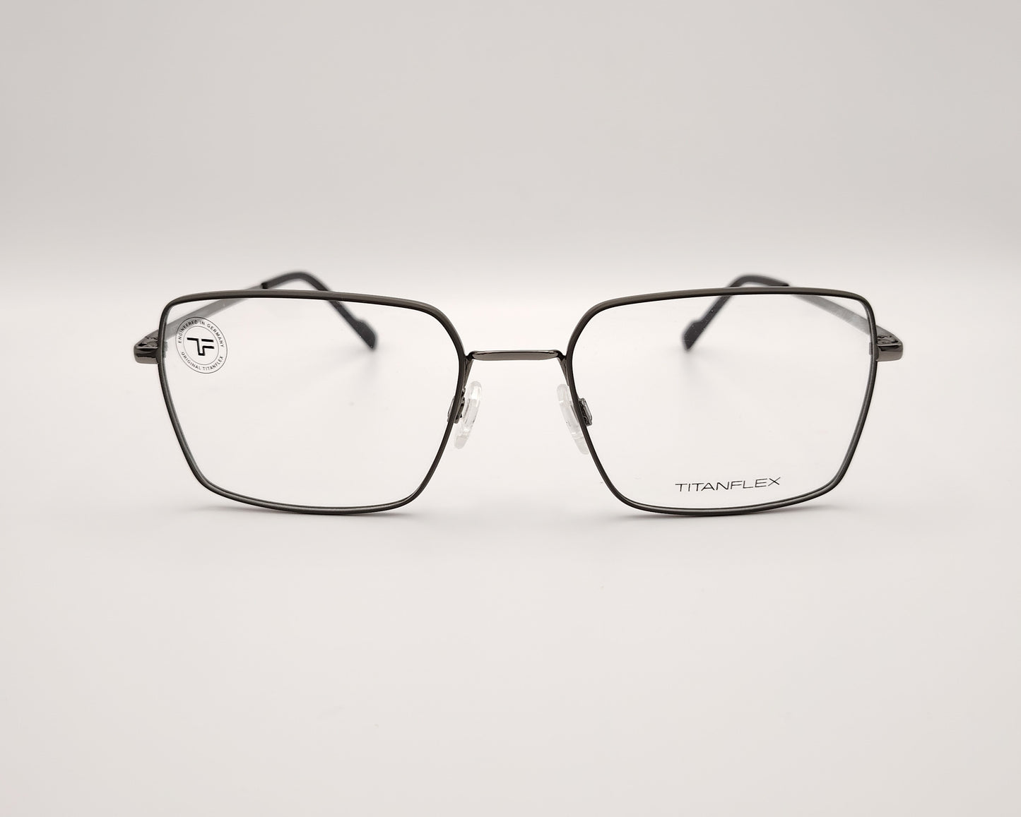 gafas titanflex rectangulares con montura metálica oscura 