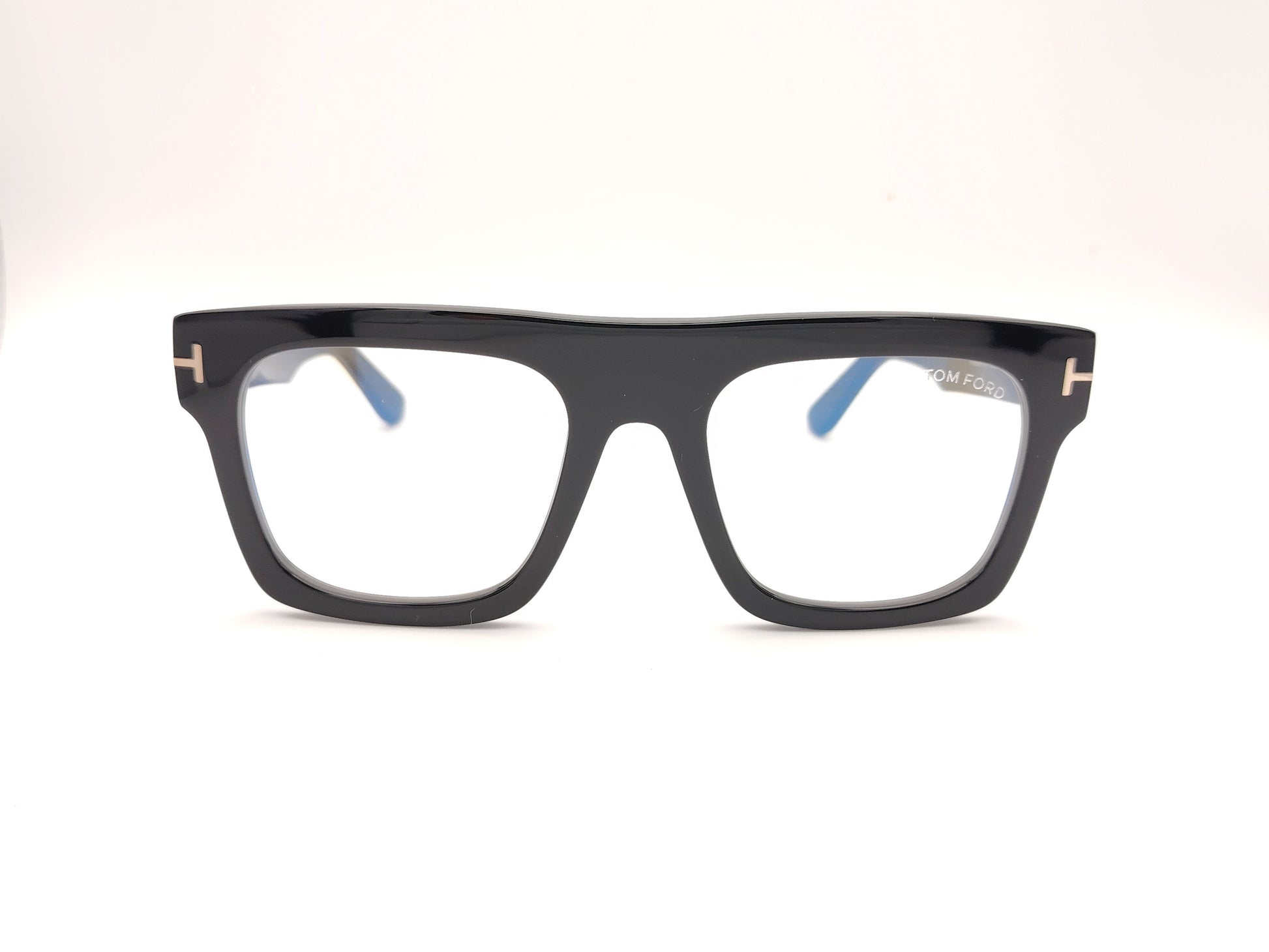gafas de pasta negra rectangulares con clip solar marrón