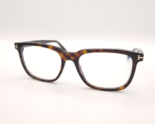 gafas de pasta color carey con forma rectangular y detalle metálico lateral