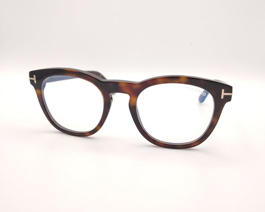 gafas redondas color carey con montura de pasta y detalle metálico lateral
