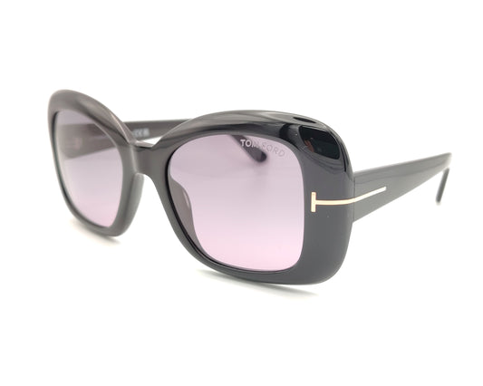 gafas de sol tom ford negras oversize con lentes violetas y detalle metálico en las varillas