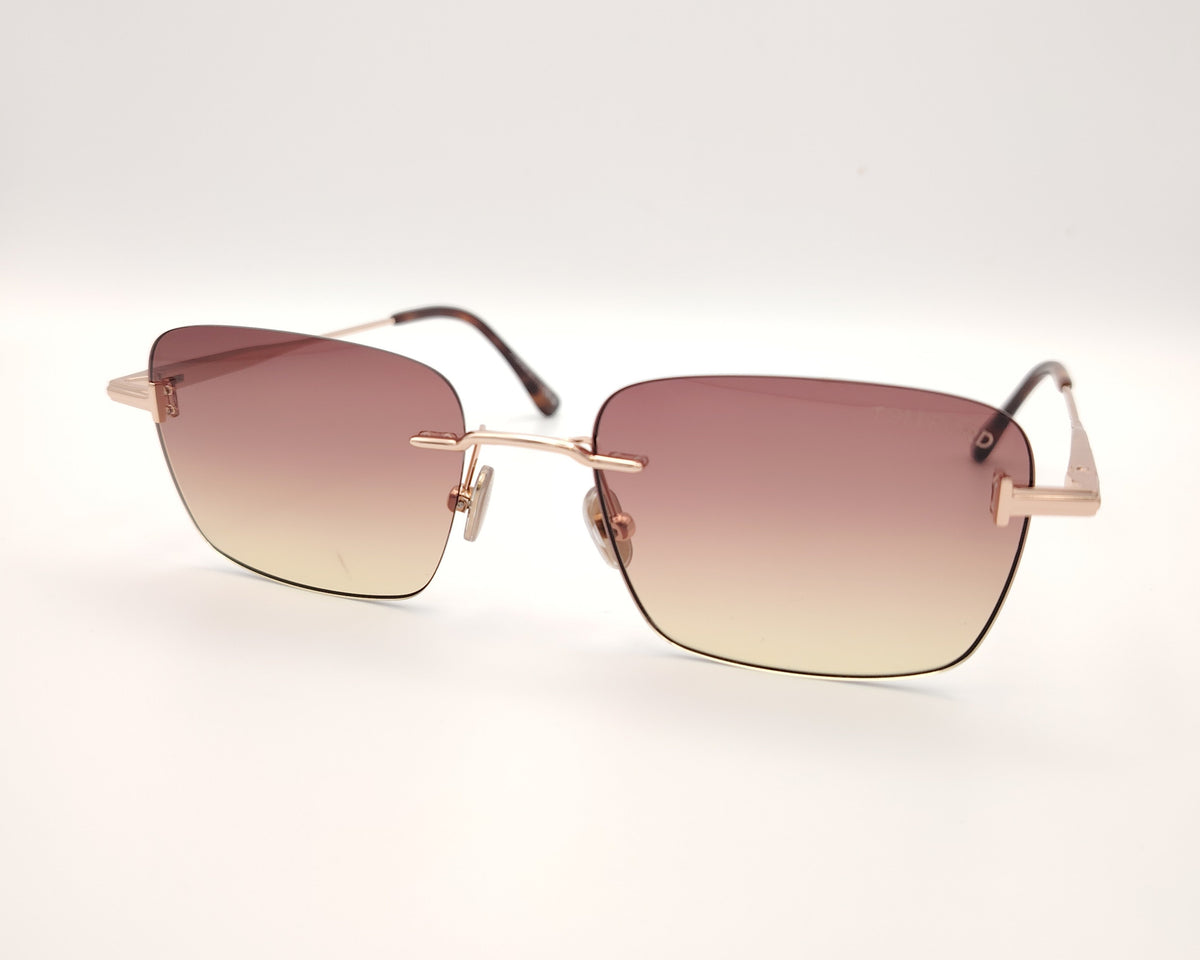 gafas de sol tom ford sin montura doradas con lentes degradadas rosa y ámbar rectangulares