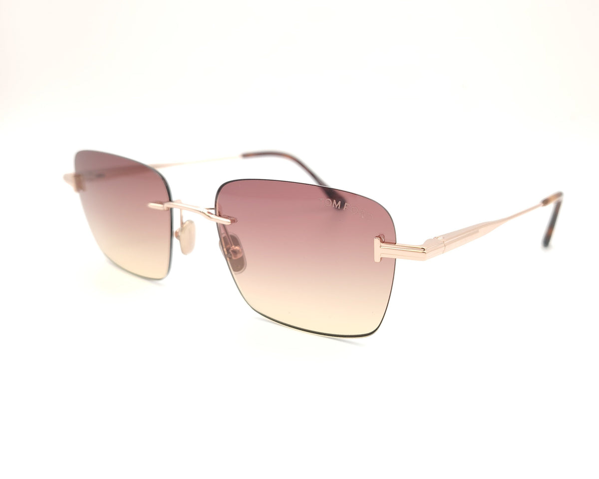 gafas de sol tom ford sin montura doradas con lentes degradadas rosa y ámbar rectangulares