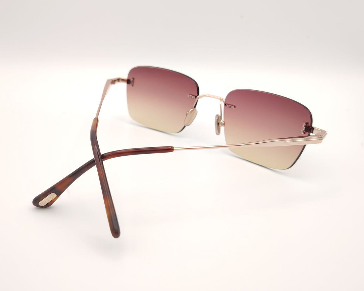 gafas de sol tom ford sin montura doradas con lentes degradadas rosa y ámbar rectangulares