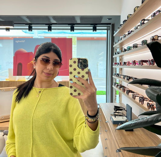 gafas de sol tom ford sin montura doradas con lentes degradadas rosa y ámbar rectangulares