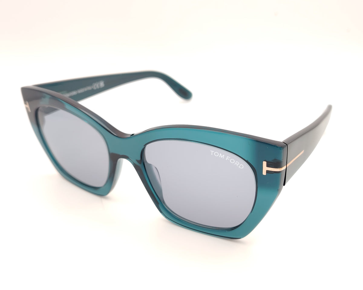 gafas tom ford oversize en azul petróleo translúcido con detalle metálico dorado