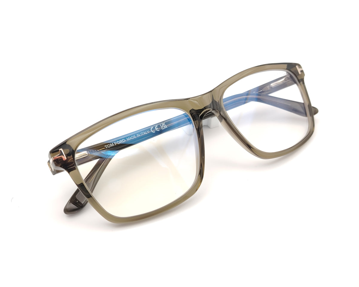 gafas graduadas tom ford tf5479 096 de acetato verde oliva translúcido con montura rectangular y detalle metálico en forma de t en las varillas