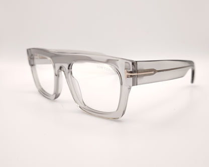 gafas graduadas de forma cuadrada con montura gruesa en gris traslúcido y detalle metálico dorado en las varillas