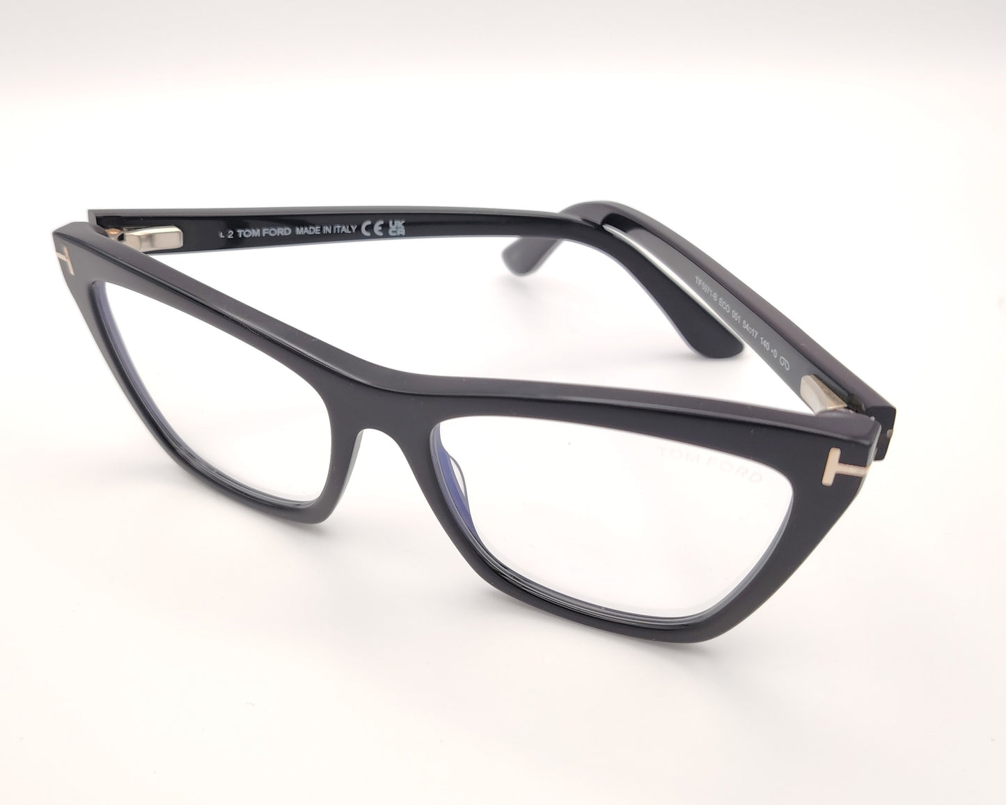 gafas tom ford negras con clip solar magnético y forma cat eye con detalle metálico