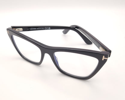 gafas tom ford negras con clip solar magnético y forma cat eye con detalle metálico