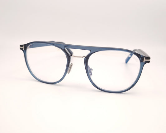 gafas graduadas azul translúcido estilo aviador con puente metálico y detalle tom ford en las patillas
