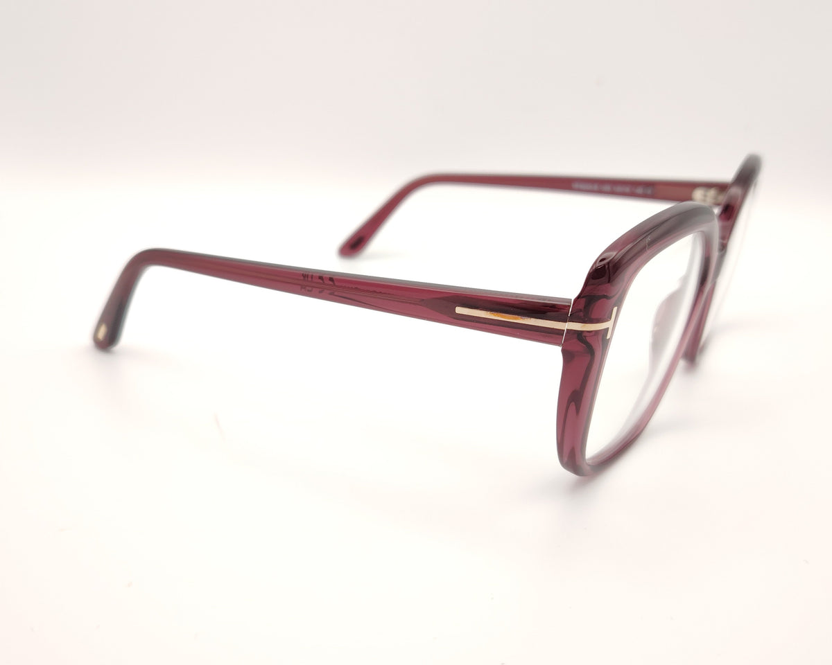 gafas tom ford oversize color ciruela translúcido con detalle metálico dorado