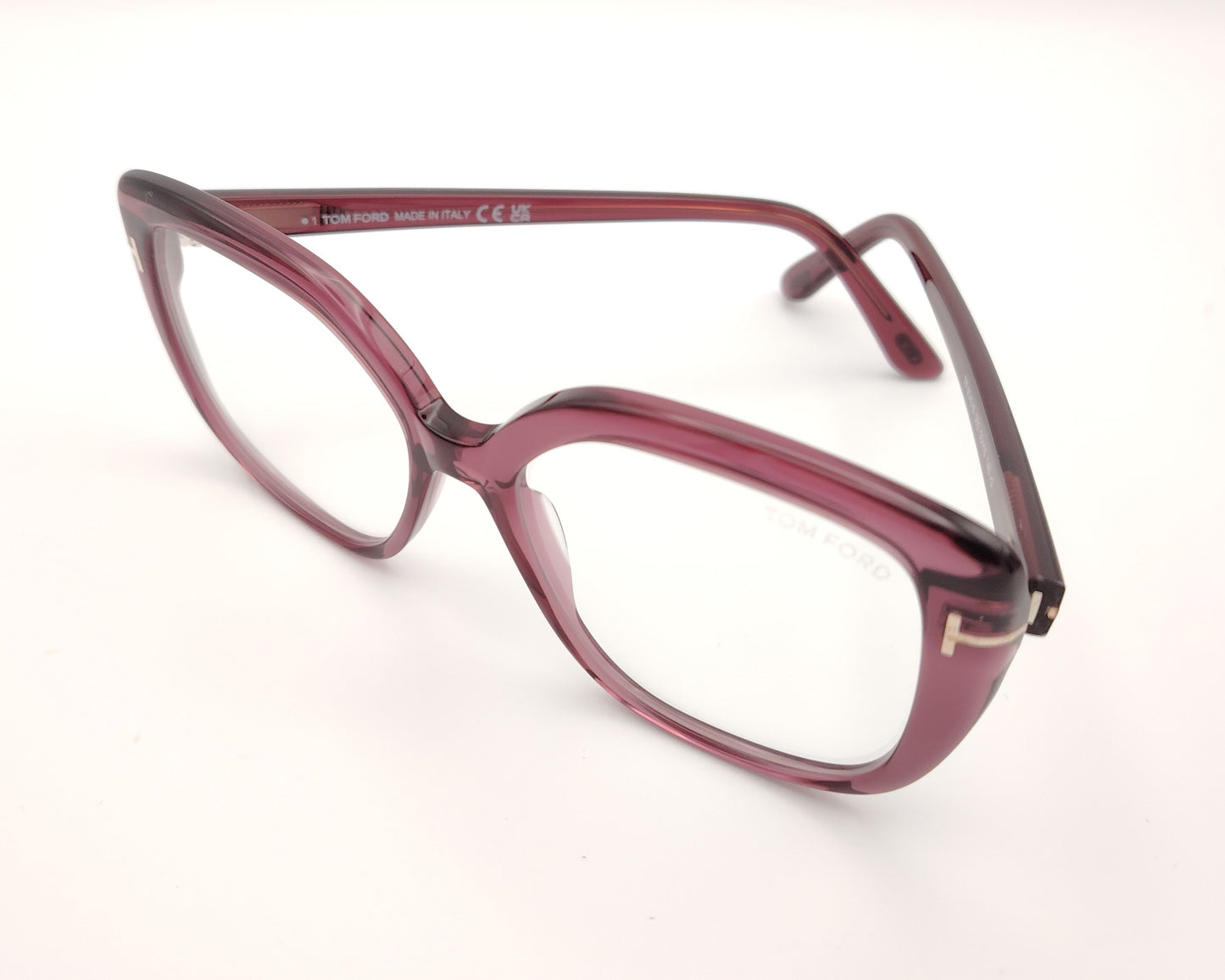 gafas tom ford oversize color ciruela translúcido con detalle metálico dorado