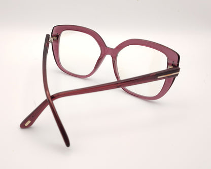 gafas tom ford oversize color ciruela translúcido con detalle metálico dorado