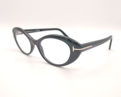 gafas tom ford negras ovaladas de acetato con detalle metálico en las varillas