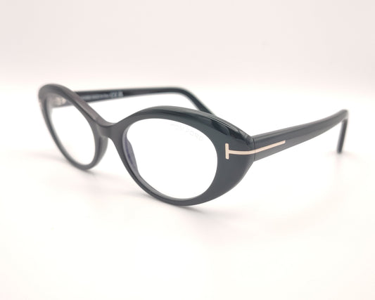 gafas tom ford negras ovaladas de acetato con detalle metálico en las varillas