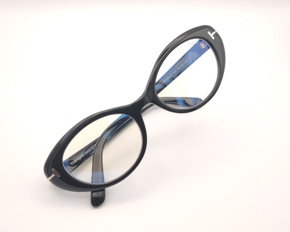 gafas tom ford negras ovaladas de acetato con detalle metálico en las varillas