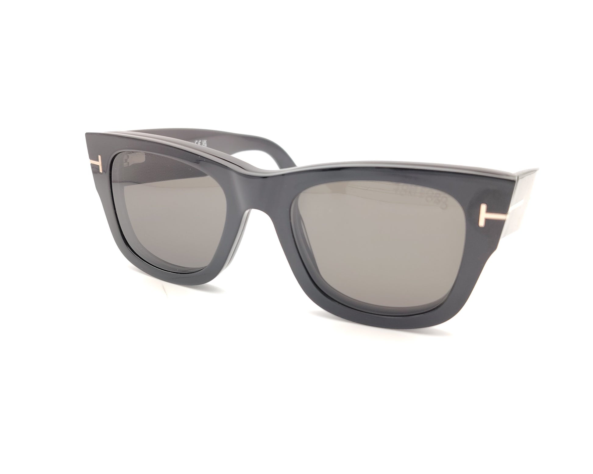 gafas tom ford negras cuadradas con clip solar magnético y detalle metálico en la varilla