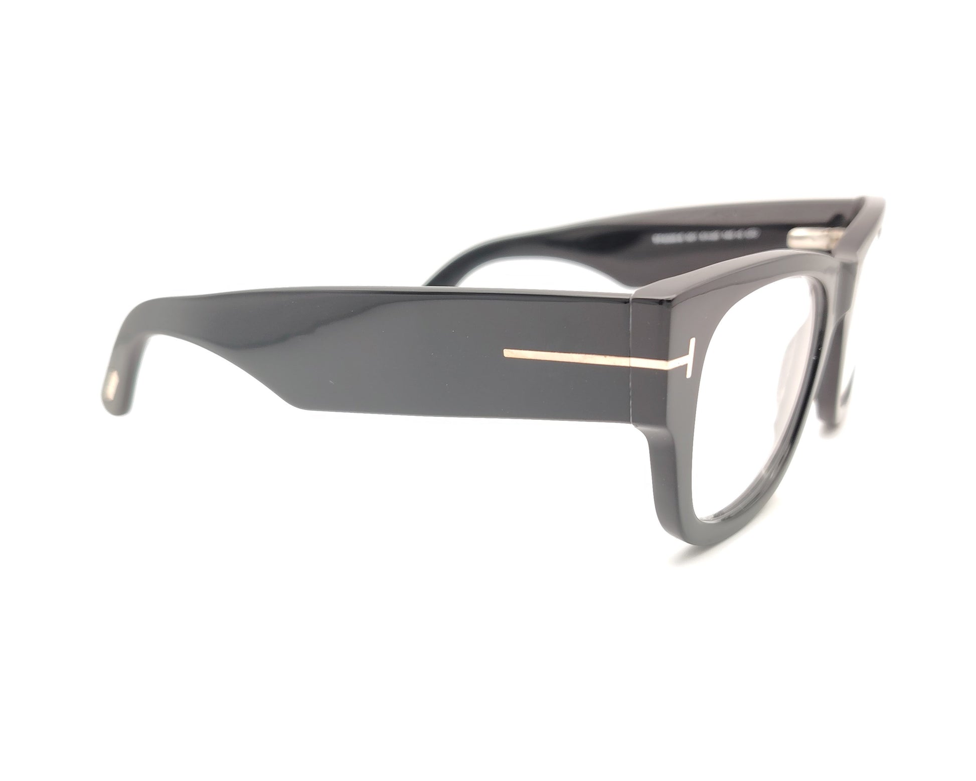 gafas tom ford negras cuadradas con clip solar magnético y detalle metálico en la varilla
