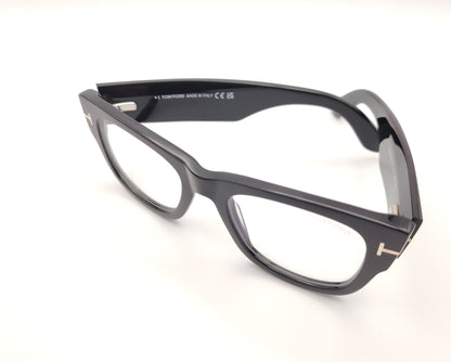gafas tom ford negras cuadradas con clip solar magnético y detalle metálico en la varilla