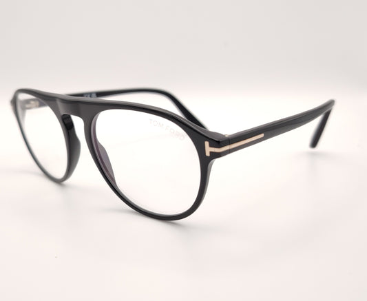 gafas tom ford negras estilo aviador con montura de acetato y detalle metálico en la varilla