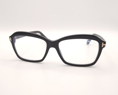 gafas tom ford negras con montura cuadrada y detalles metálicos en las varillas