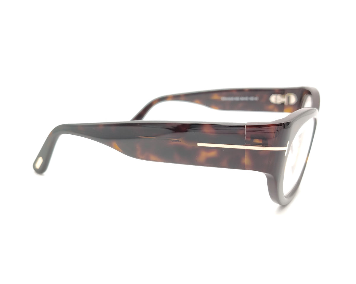 gafas tom ford ovaladas de acetato carey con varillas anchas y detalle metálico en las patillas