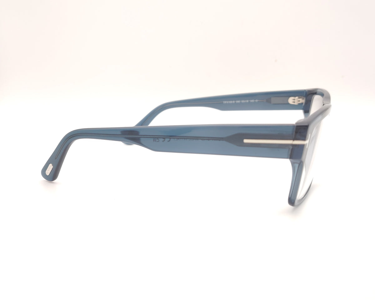 gafas tom ford rectangulares de acetato azul translúcido con varillas anchas y detalle metálico
